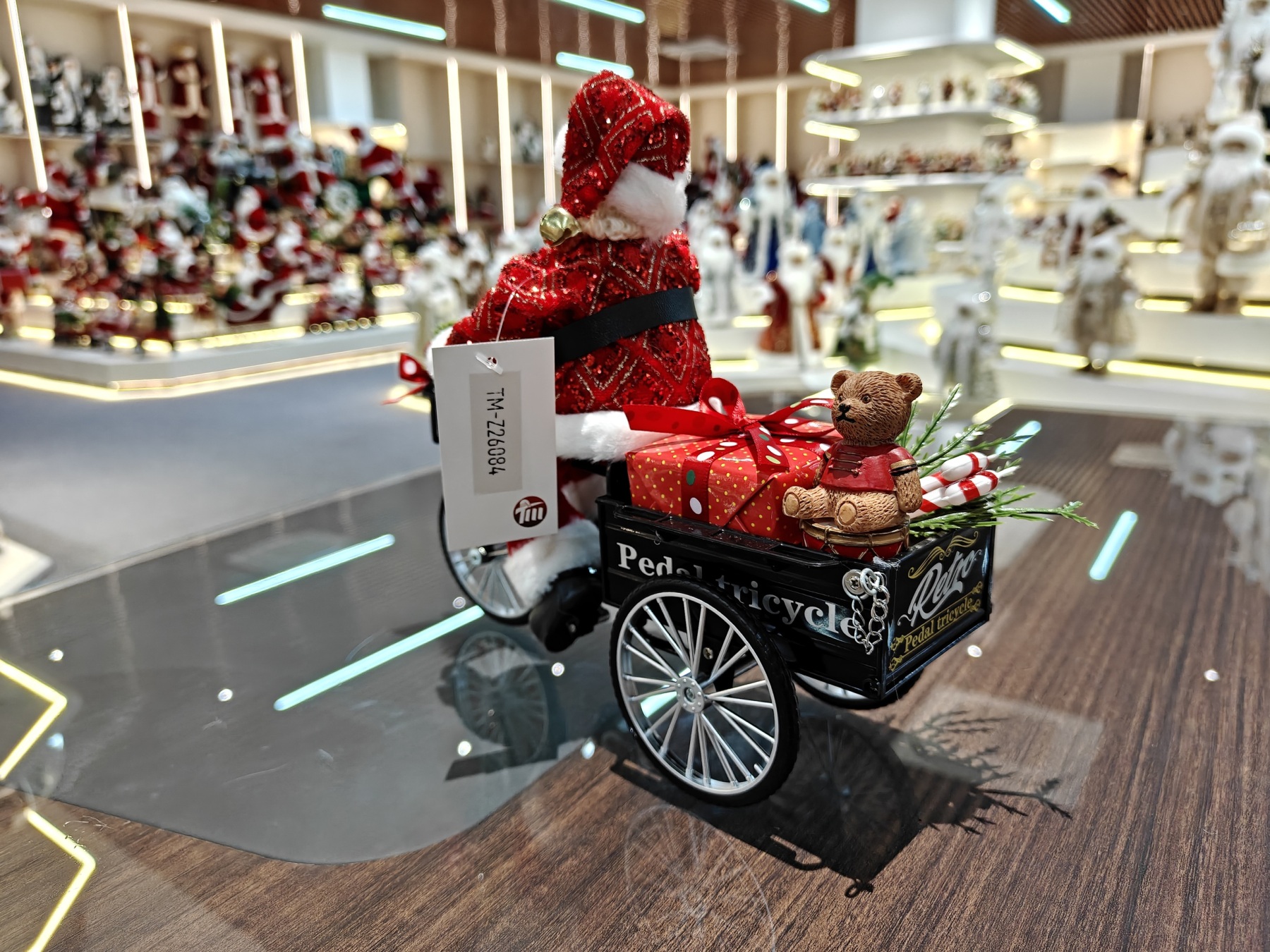 2026 Xmas Handmade Resin Santa Claus Doll with a Tricycle Christmas Gift Handicraft Polyresin Santa Claus Indoor Decoration
