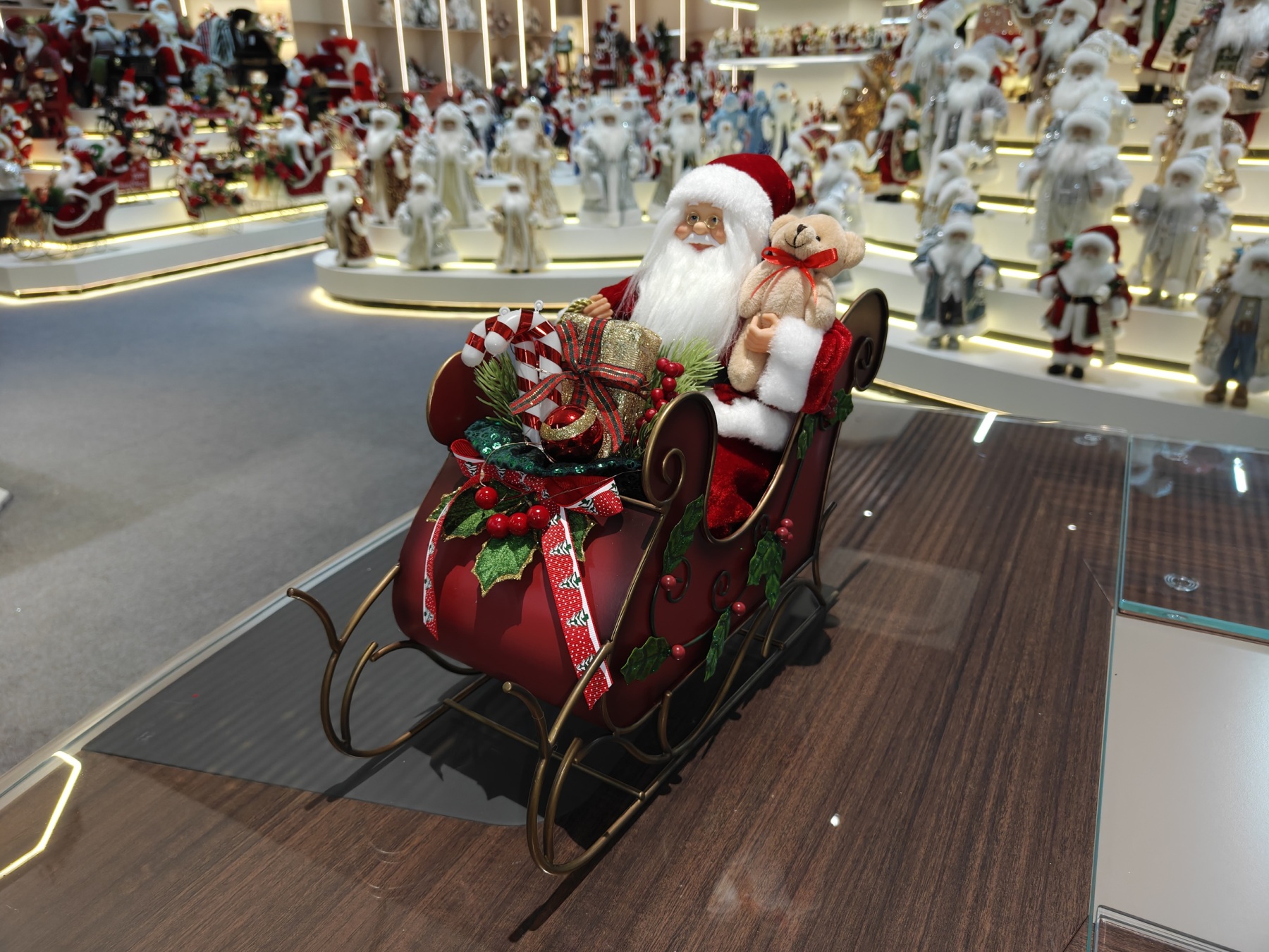 2027 New Classic Christmas Santa Doll Sitting on the Red&Green Sleigh with Music and Light Xmas Decorations Gifts Santa Claus