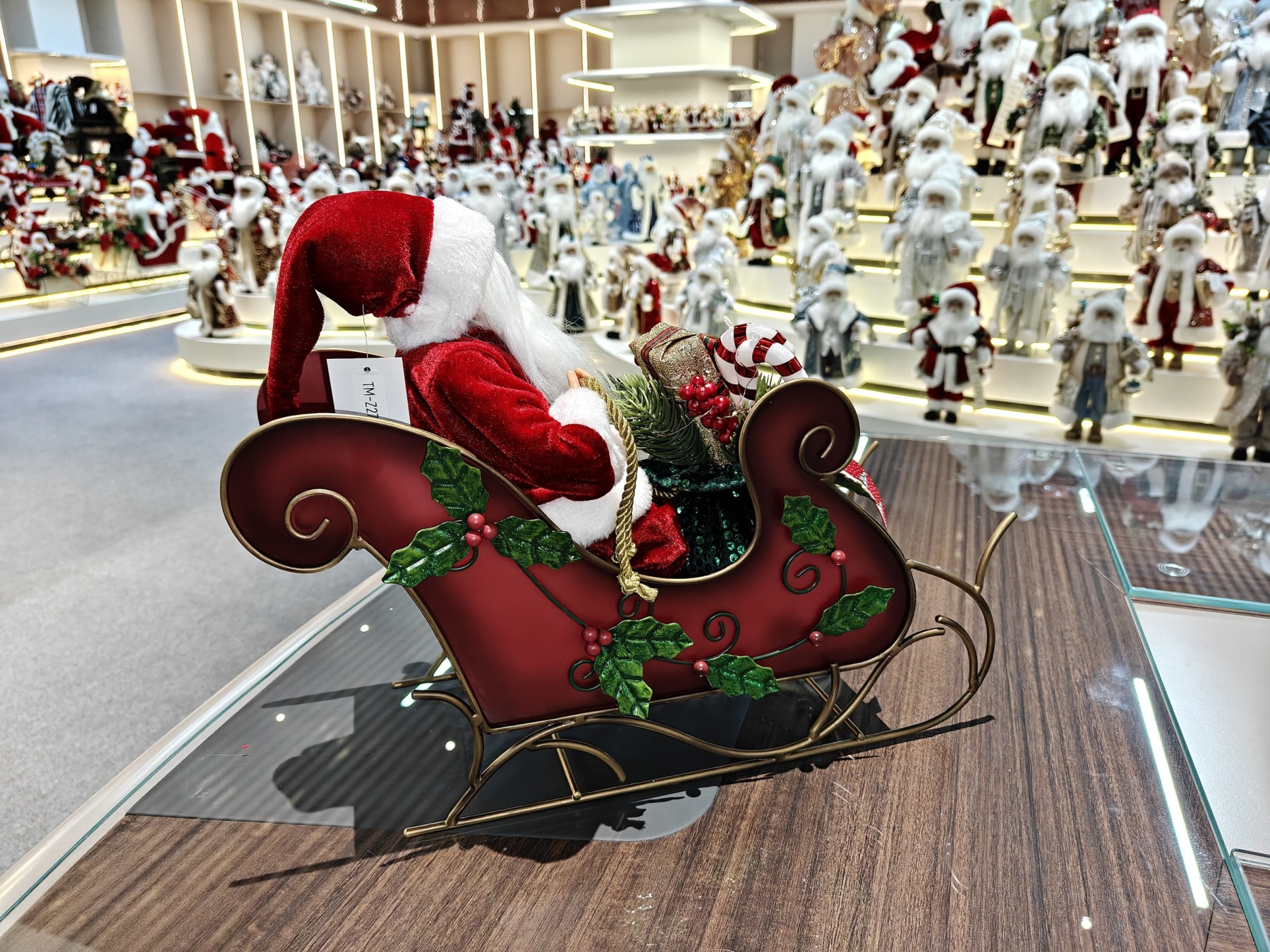 2027 New Classic Christmas Santa Doll Sitting on the Red&Green Sleigh with Music and Light Xmas Decorations Gifts Santa Claus