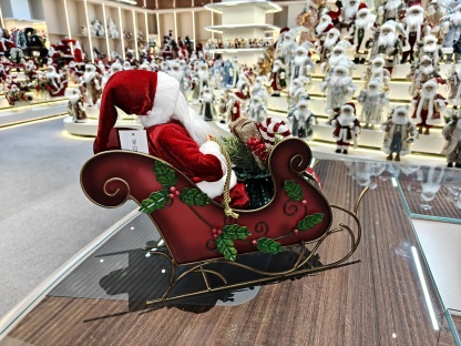 2027 New Classic Christmas Santa Doll Sitting on the Red&Green Sleigh with Music and Light Xmas Decorations Gifts Santa Claus