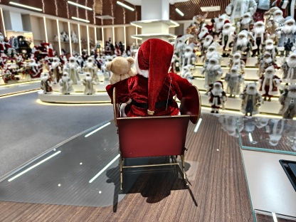 2027 New Classic Christmas Santa Doll Sitting on the Red&Green Sleigh with Music and Light Xmas Decorations Gifts Santa Claus