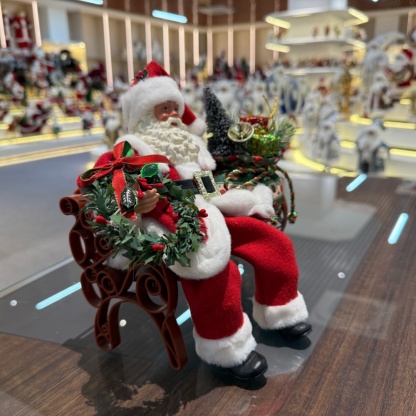 11Inch Xmas Handmade Resin Santa Claus Doll Sitting With Christmas Gift Bag Handicraft Polyresin Santa Claus Indoor Decoration