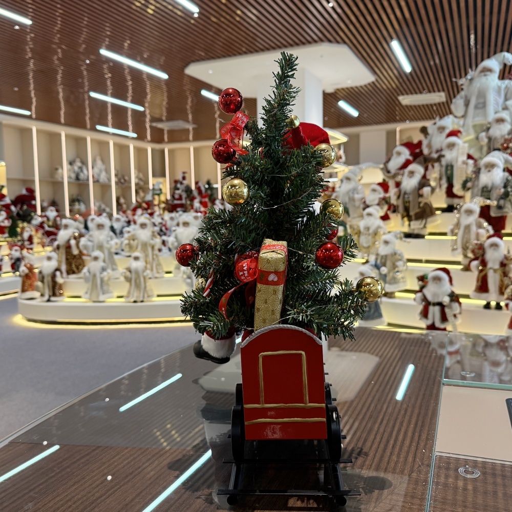 Handmade Animated Santa Claus Sitting On a Train with Xmas Tree Acoustical Control LED Light Musical Santa Claus Doll Christmas Decoration