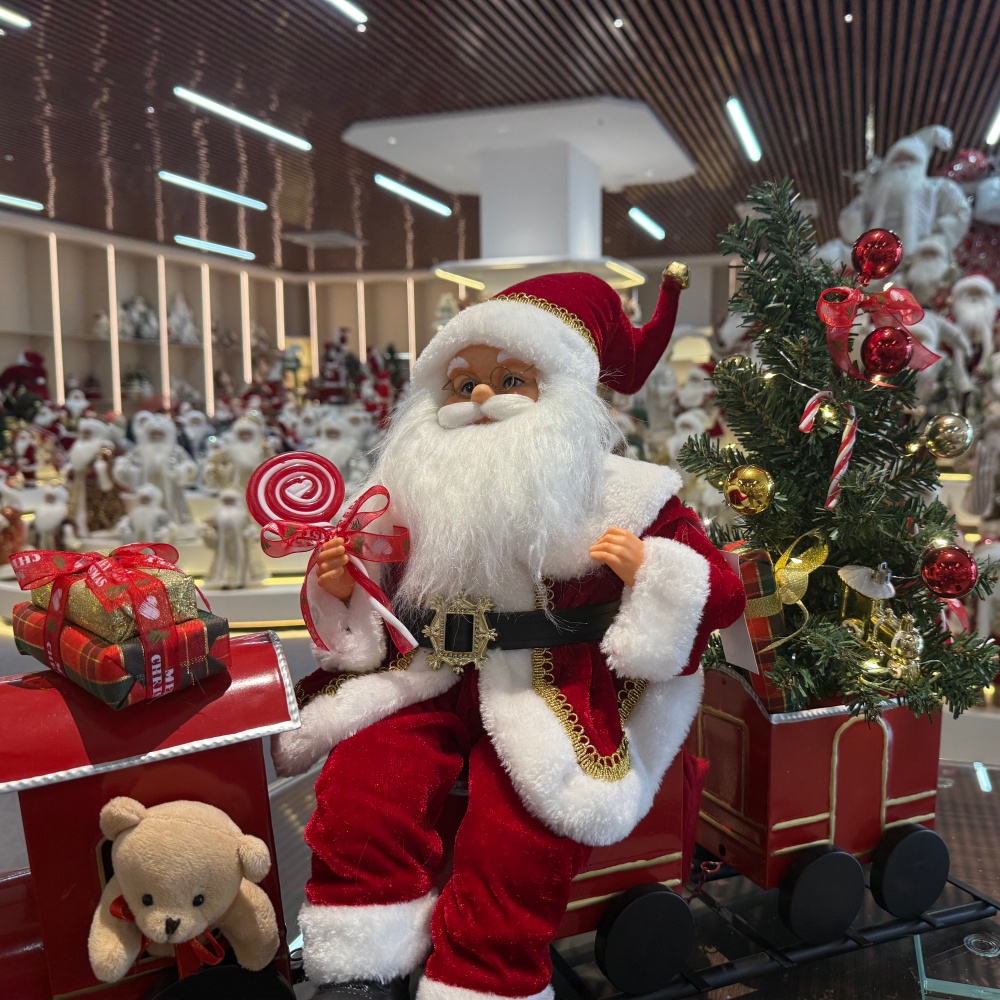 Handmade Animated Santa Claus Sitting On a Train with Xmas Tree Acoustical Control LED Light Musical Santa Claus Doll Christmas Decoration