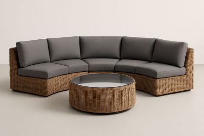 Divano angolare in rattan con cuscini in poliestere grigio e tavolino in vetro temperato