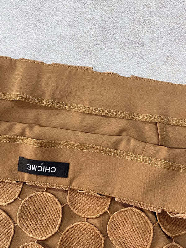 1694857
