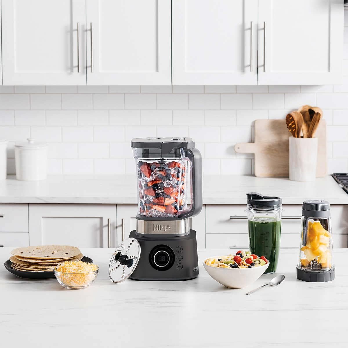 Licuadora de Uso Profesional, 7 Funciones en 1, Procesador de Alimentos y Extractor de Nutrientes, 3 Cuchillas, 2 Tapas, 2 Termos y 2 Extractores de Nutrientes (Reacondicionado)