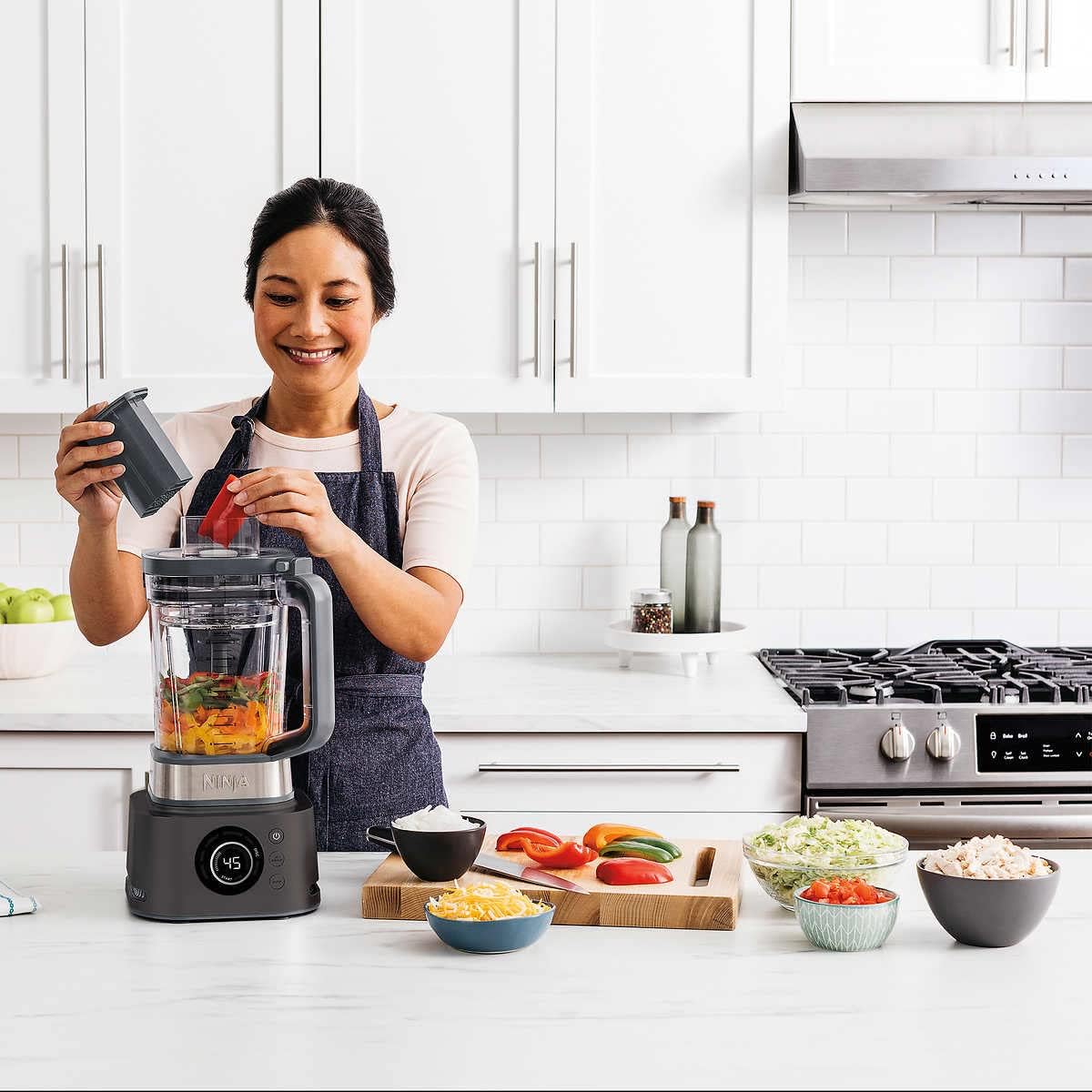 Licuadora de Uso Profesional, 7 Funciones en 1, Procesador de Alimentos y Extractor de Nutrientes, 3 Cuchillas, 2 Tapas, 2 Termos y 2 Extractores de Nutrientes (Reacondicionado)