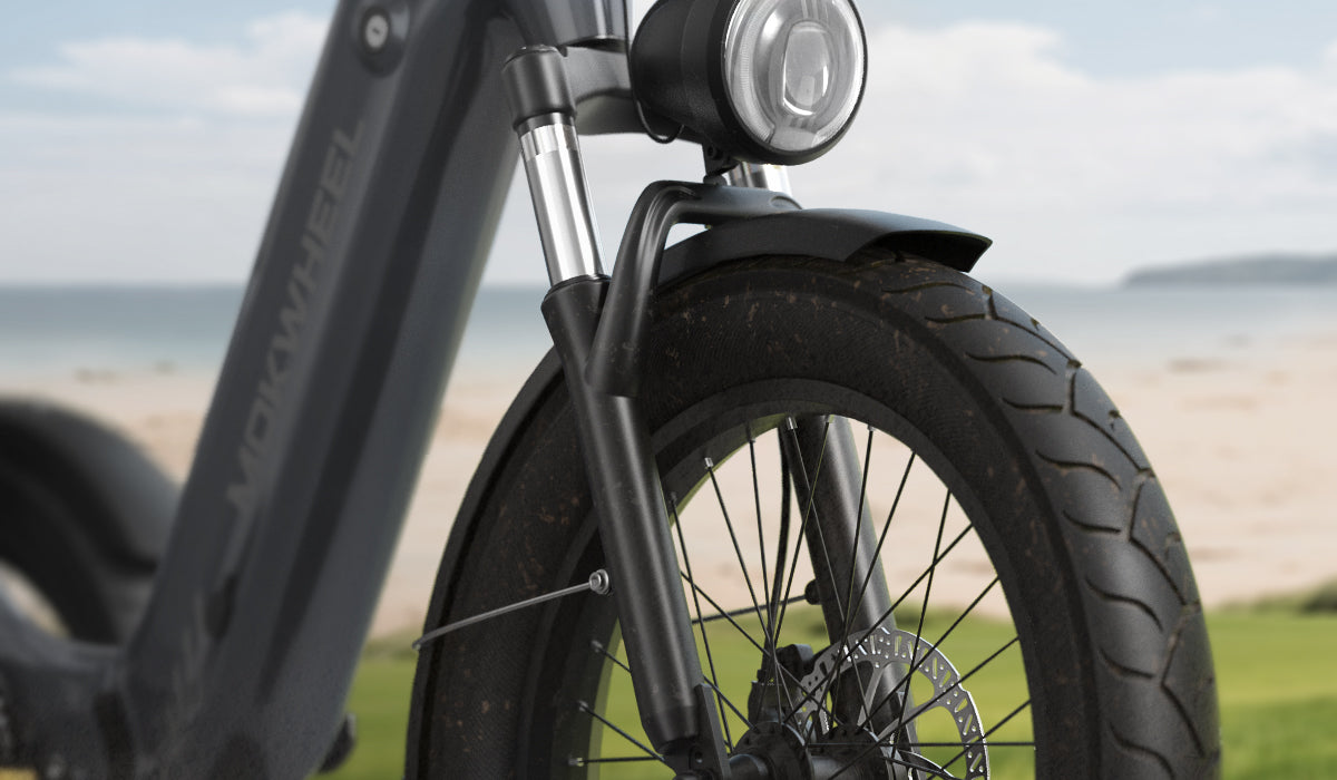 Mokwheel folding ebike with 80mm suspension fork and padded backrest saddle for a smooth, comfortable ride