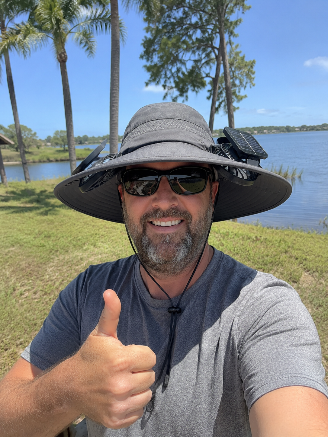 Happy customer wearing the solar fan sun hat during outdoor fishing, gardening, or hiking