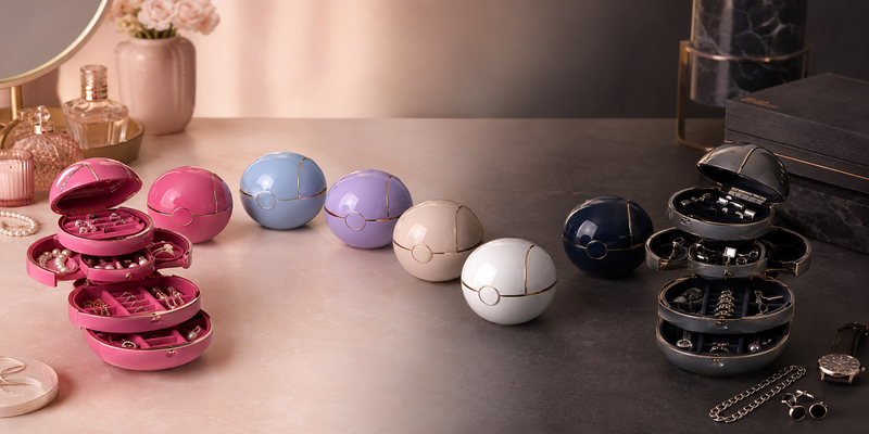 Purple automatic spherical jewelry box fully opened on a vanity