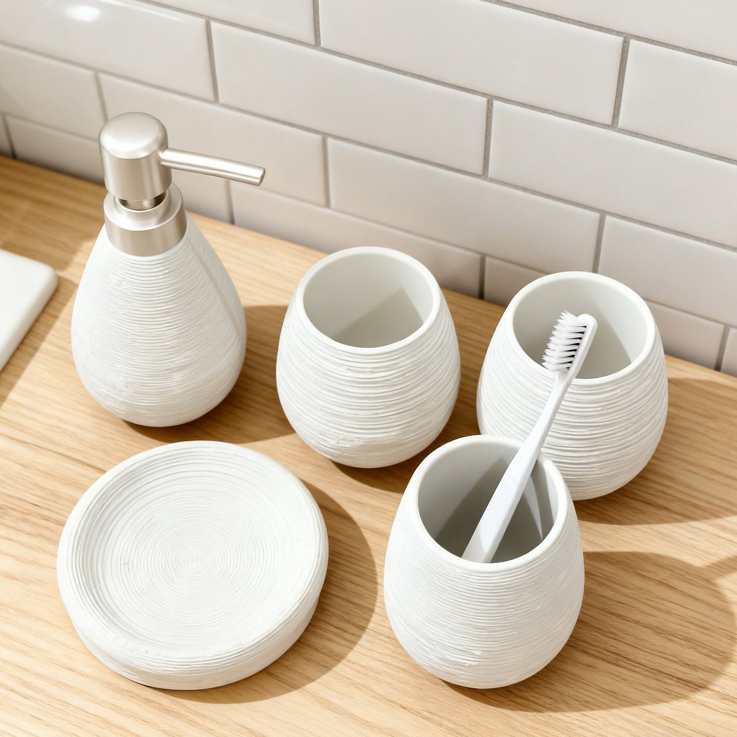 Complete ceramic bathroom set on countertop