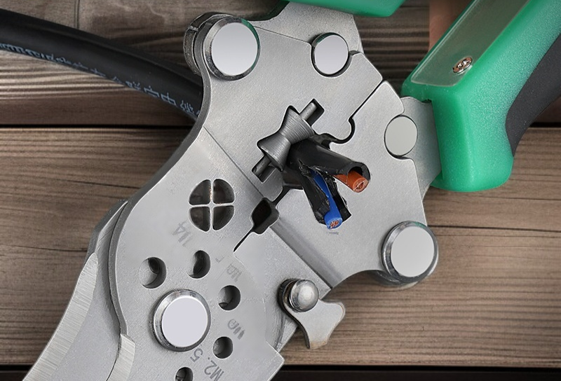 Wire stripping pliers with electrical testing feature