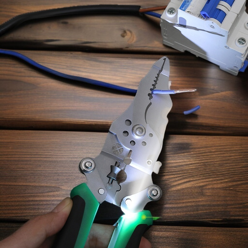 Compact wire stripping and testing tool on workbench