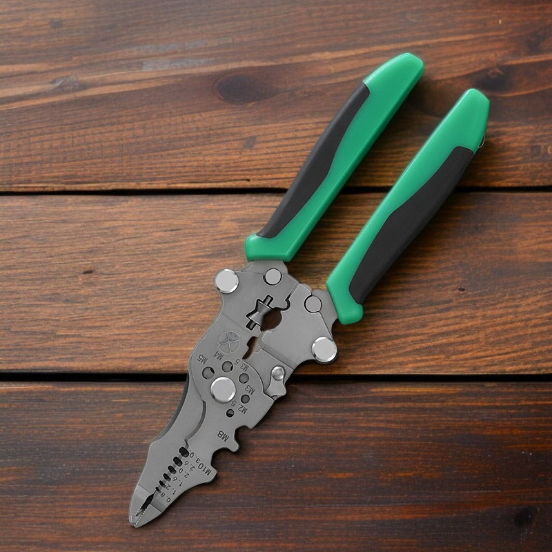 Multi functional folding wire stripping pliers with electrical testing capabilities