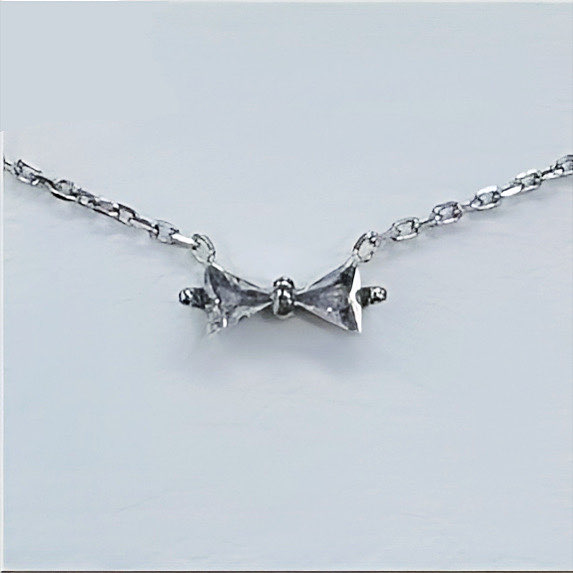 A203 Tie The Charm Necklace