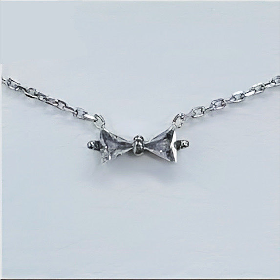 A203 Tie The Charm Necklace