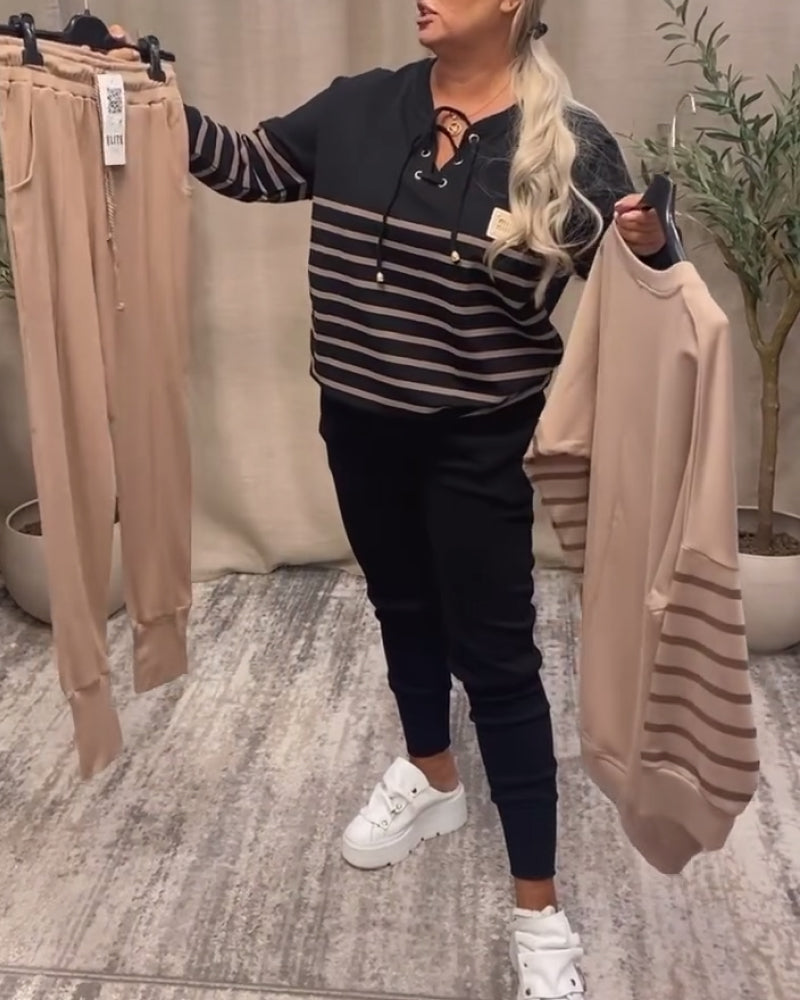 Dwuczęściowy zestaw sportowy w paski do kostki