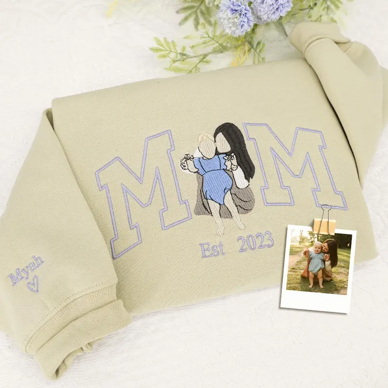 Custom Embroidered Mom Portrait Sweatshirt – Turn your favorite photo into a beautifully stitched keepsake. This personalized sweatshirt featuring Mom and her kids makes a heartfelt and timeless gift she’ll cherish forever. 💖