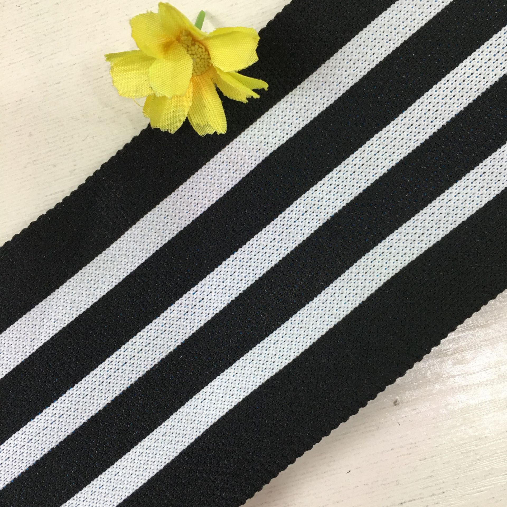 Custom-made ribbed knit fabric, collar and hem trims, elastic cuffs and necklines, lace fabric for clothing wholesale. Custom design and manufacturing available.