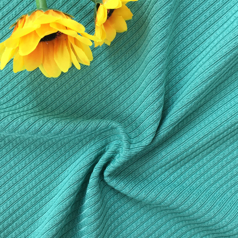 250 grams of starry sky ribbed polyester lace knitted fabric with raised stripes, for women's short-sleeved skirts and trousers, with vertical stripes.