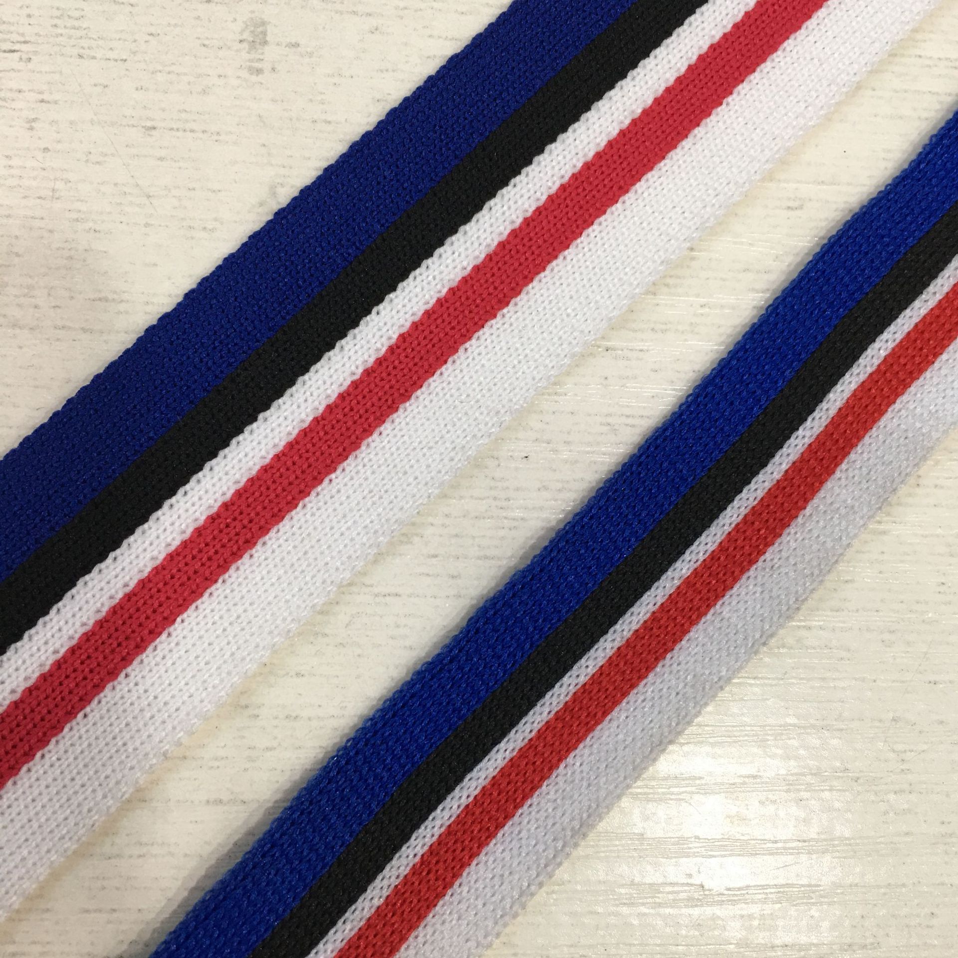 Custom-made ribbed knit fabric, collar and hem trims, elastic cuffs and necklines, lace fabric for clothing wholesale. Custom design and manufacturing available.