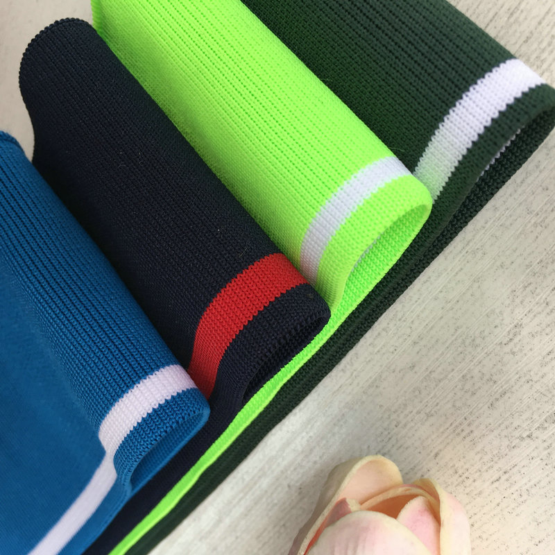 Custom 1x1 ribbed fabric, 100% polyester, for t-shirts, sportswear, collars, cuffs, and hems. Fabric processing and custom manufacturing services available.