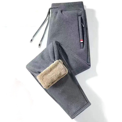 Swobodne i wytrzymałe spodnie sportowe z grubą podszewką z owczej wełny