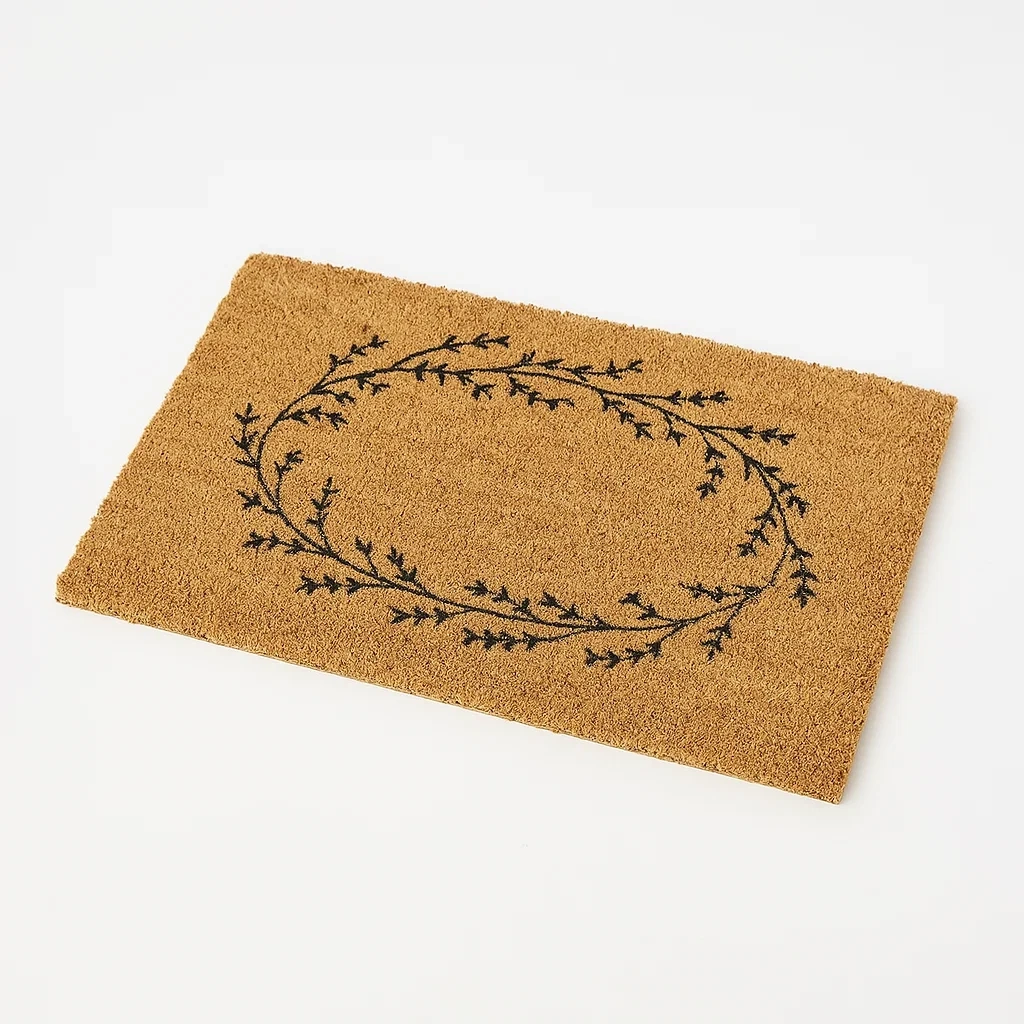 Tapis d'entrée en fibre de coco avec motif végétal noir
