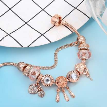 Rózsaszín álomfogó karkötő medálokkal, sterling ezüstből