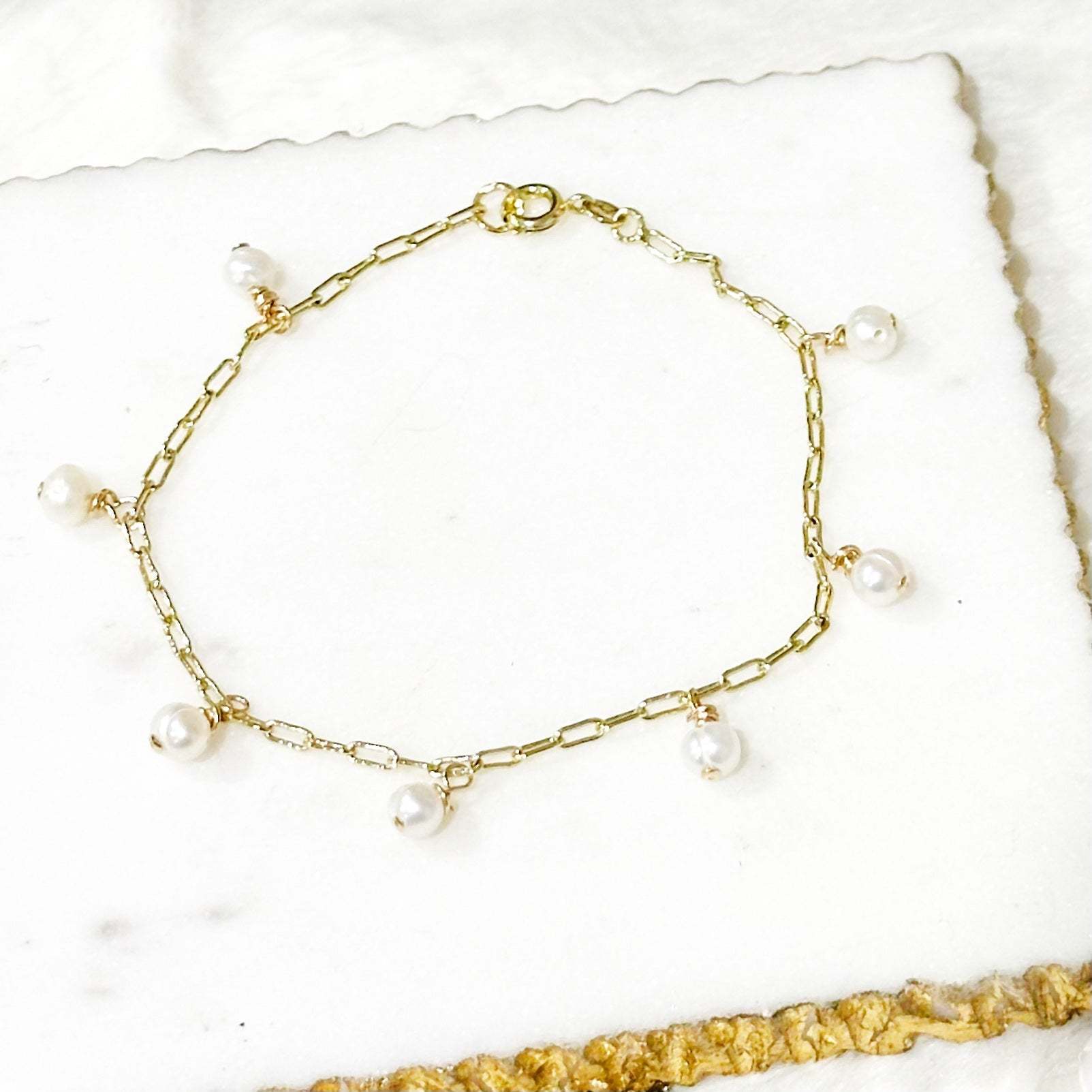 Gina mini gyöngy medál karkötő