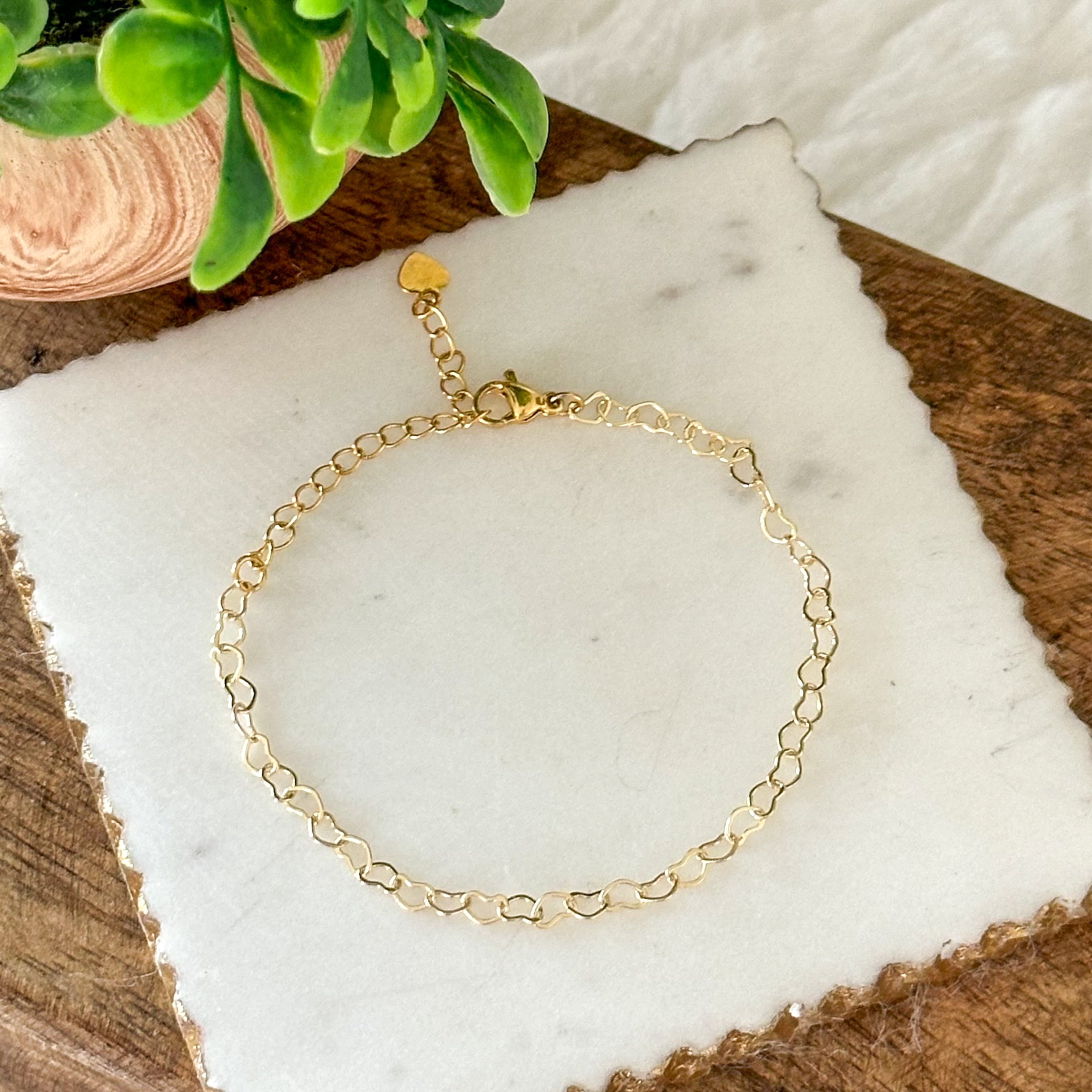 Mea szív alakú szemek karkötő