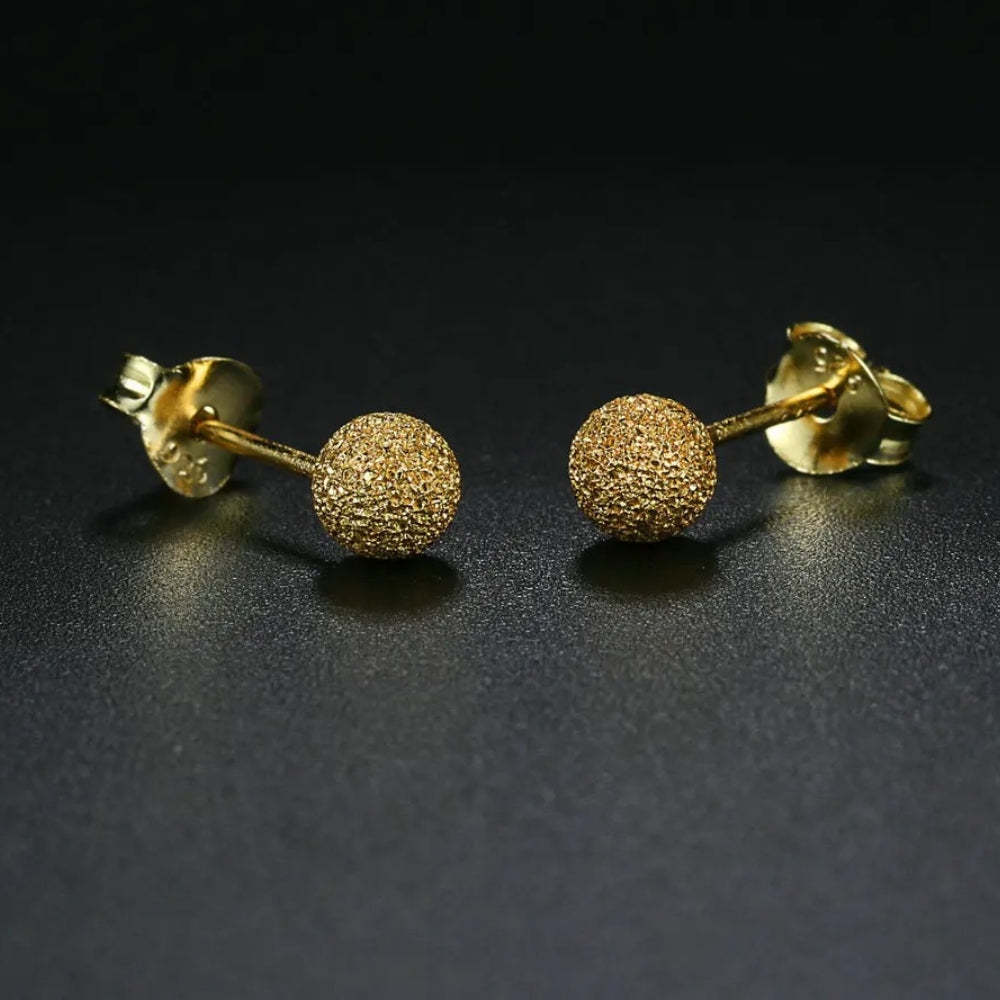 Arany csillogó texturált gömb alakú fülbevalók