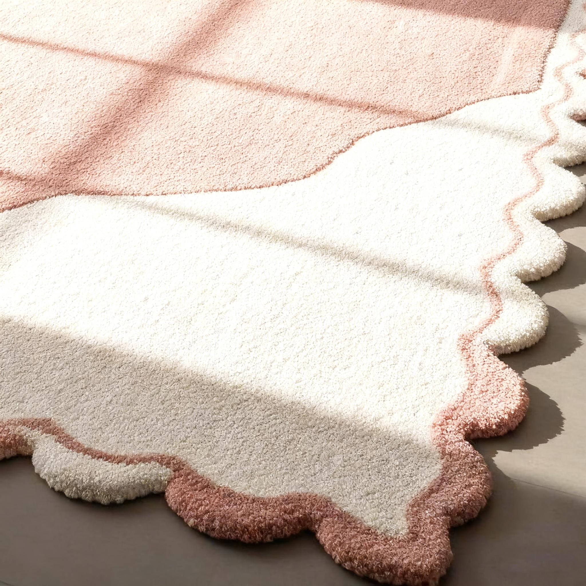 Tapis en laine tufté main : bords ondulés festonnés roses