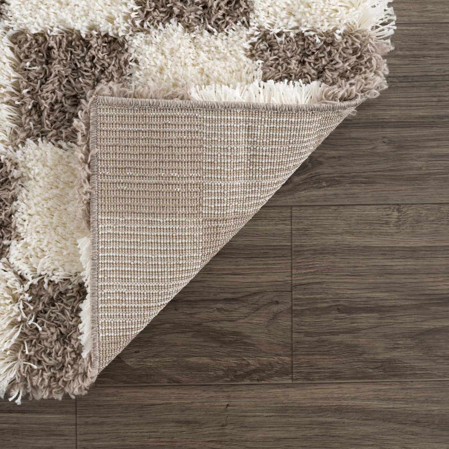 Atira brown checkered rug