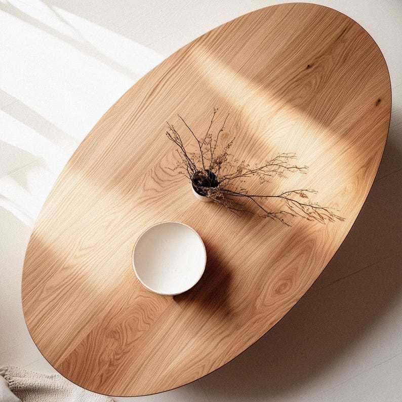 Table basse ovale en chêne massif. Table basse pour salon.