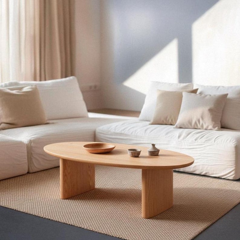 Table basse ovale en chêne massif. Table basse pour salon.