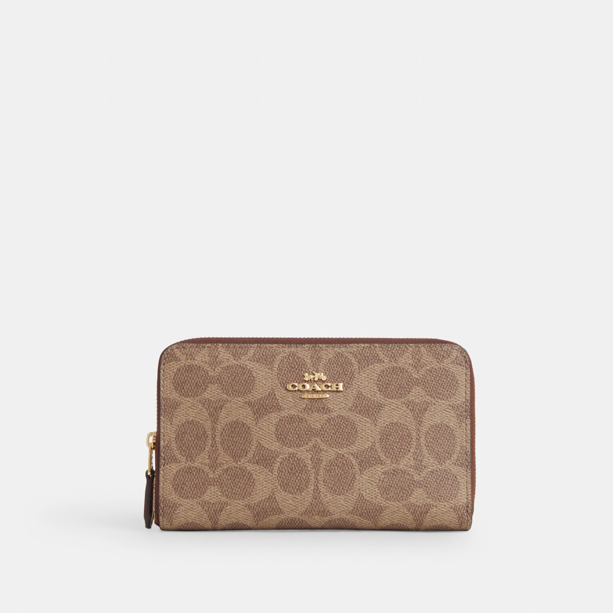 COACH®,Medium Id Zip Wallet In Signature Canvas,Bi Fold,Continental,Coin,Sustainable,Casual,Brown,Front View