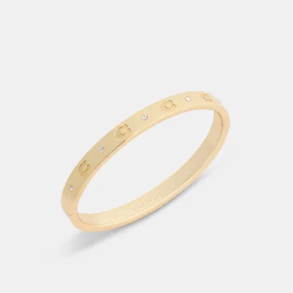 COACH®,Repeated C Hinged Bangle,Cubic Zirconia,Glass,Gem Embellishment,Logo,Stackable,Brass Gold,Casual,Clear,Inside View,Top View