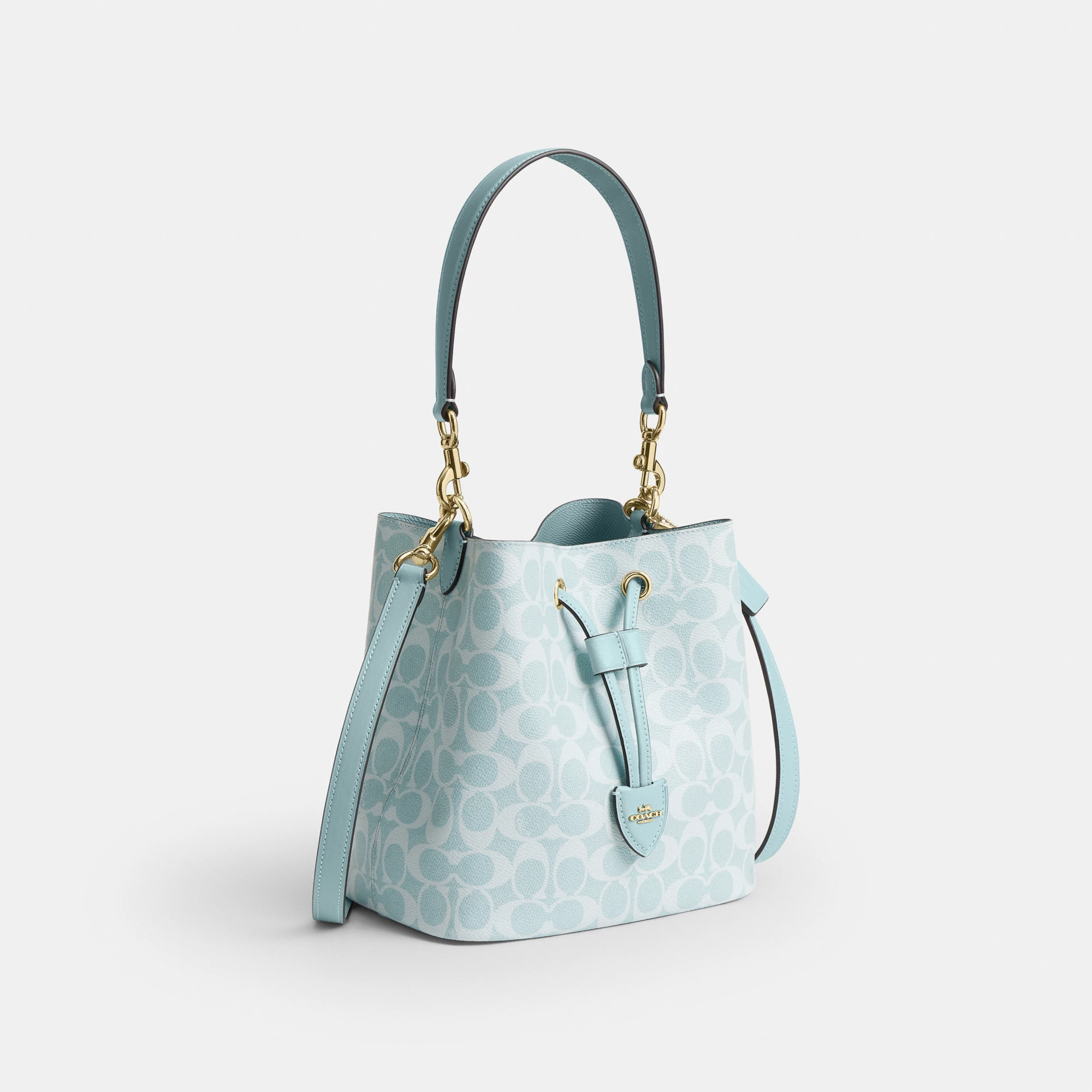 COACH®,Rowan Bucket Bag In Signature Canvas,Polyester,Leather,Recycled Polyester,Canvas,Bucket,Logo,Drawstring,Metal,Adjus...,Blue,Angle View