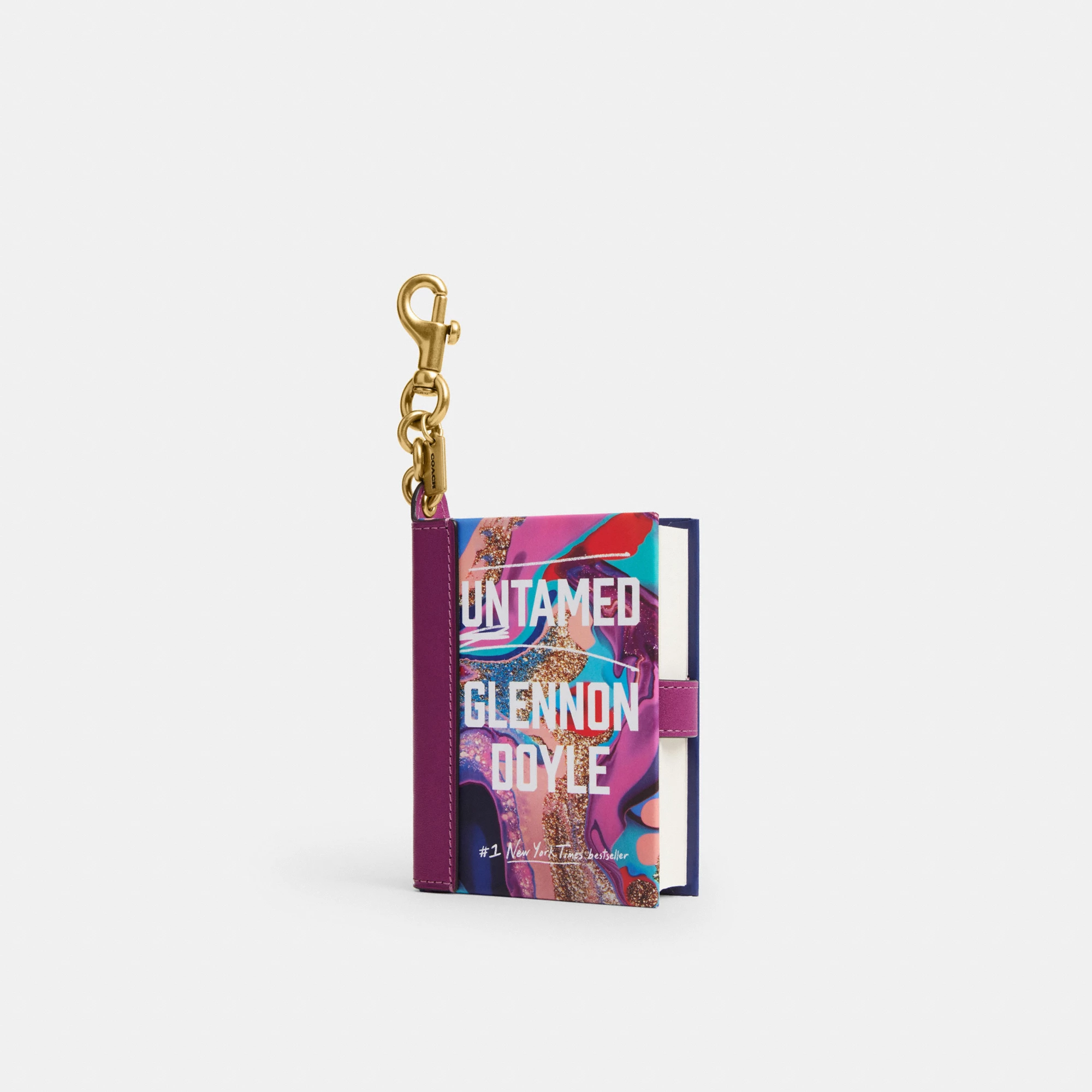 COACH®,Untamed By Glennon Doyle Book Bag Charm,Leather,Bag Charm,Paper,3D Embellishment,Color Block,Logo,Adjustable,Key Ring,Multi Color,Front View
