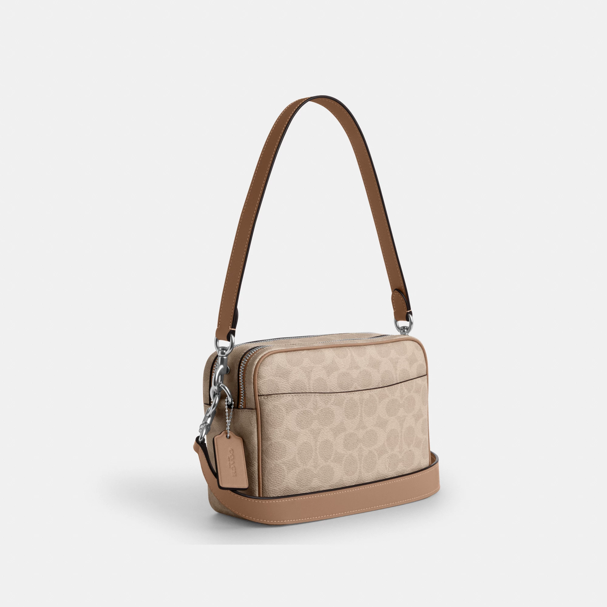 COACH®,Carey Crossbody Bag In Signature Canvas,Leather,Canvas,Recycled Polyester,Camera Bag,Metal,Logo,Sustainable,Gold Pl...,Multi Color,Angle View