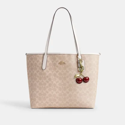 COACH®,City Tote Bag In Signature Canvas,Tote,Metal,Tag Embellishment,Color Block,Embossed,Piping,Logo,Casual,Beige,Angle View