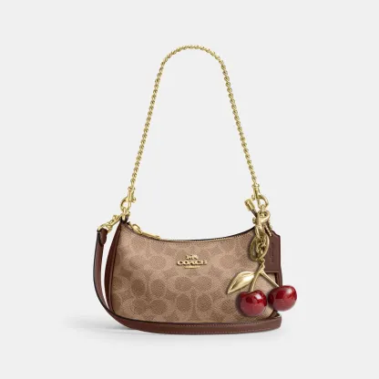 COACH®,Teri Mini Crossbody Bag In Signature Canvas,Polyester,Canvas,Recycled Polyester,Shoulder Bag,Adjustable,2 in 1,Vega...,Brown,Angle View