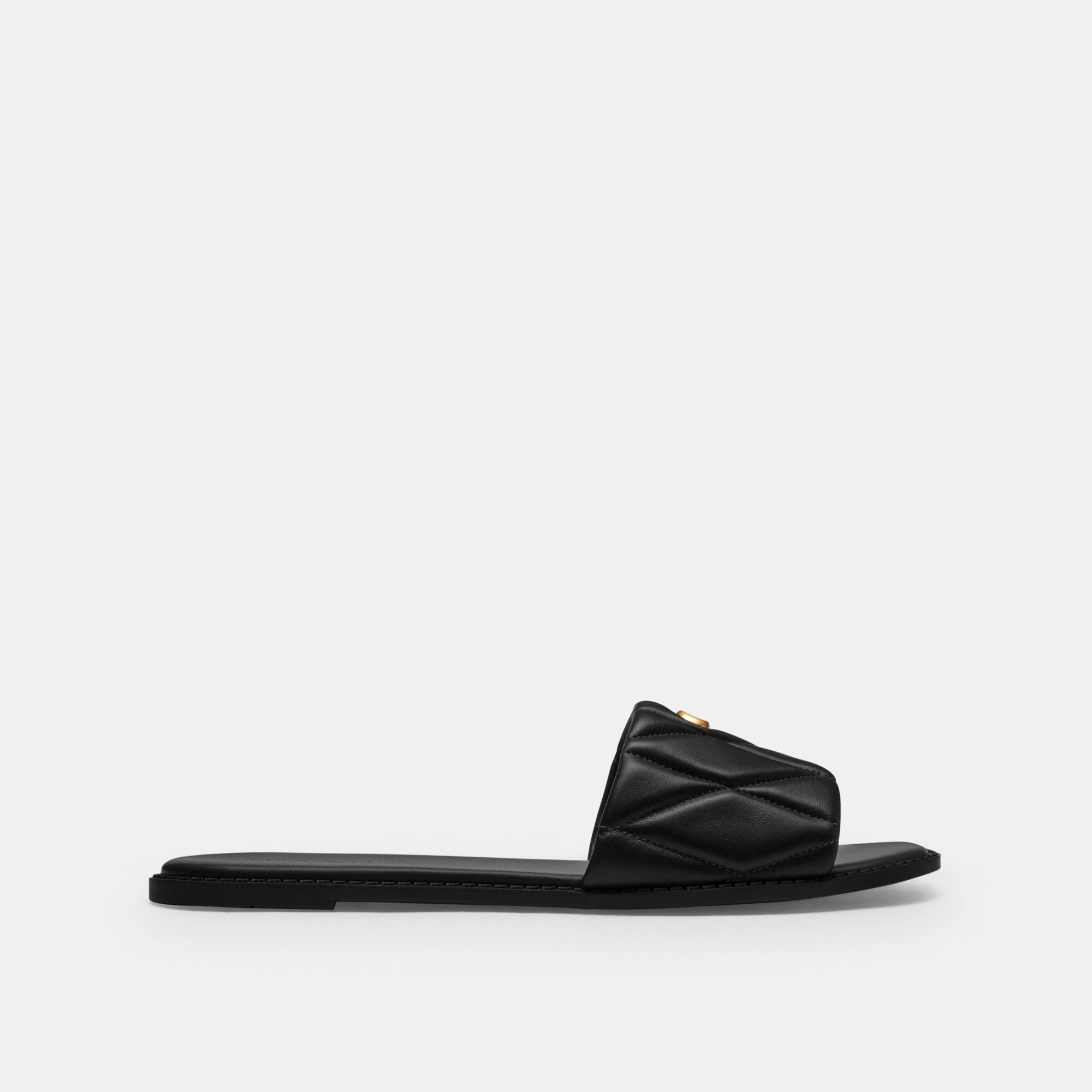 COACH®,Holly Sandal With Quilting,Rubber,Leather,Slides,Metal,Logo,Traction,Cushioned,Casual,Black,Angle View