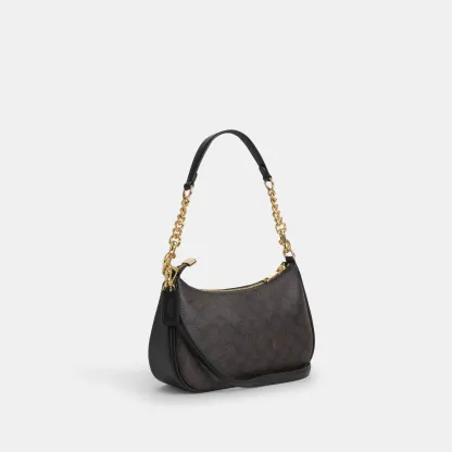 COACH®,Teri Shoulder Bag In Signature Canvas,Shoulder Bag,Logo,Tag Embellishment,Embossed,Metal,Casual,Brown,Angle View