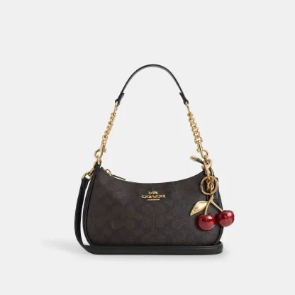 COACH®,Teri Shoulder Bag In Signature Canvas,Shoulder Bag,Logo,Tag Embellishment,Embossed,Metal,Casual,Brown,Angle View