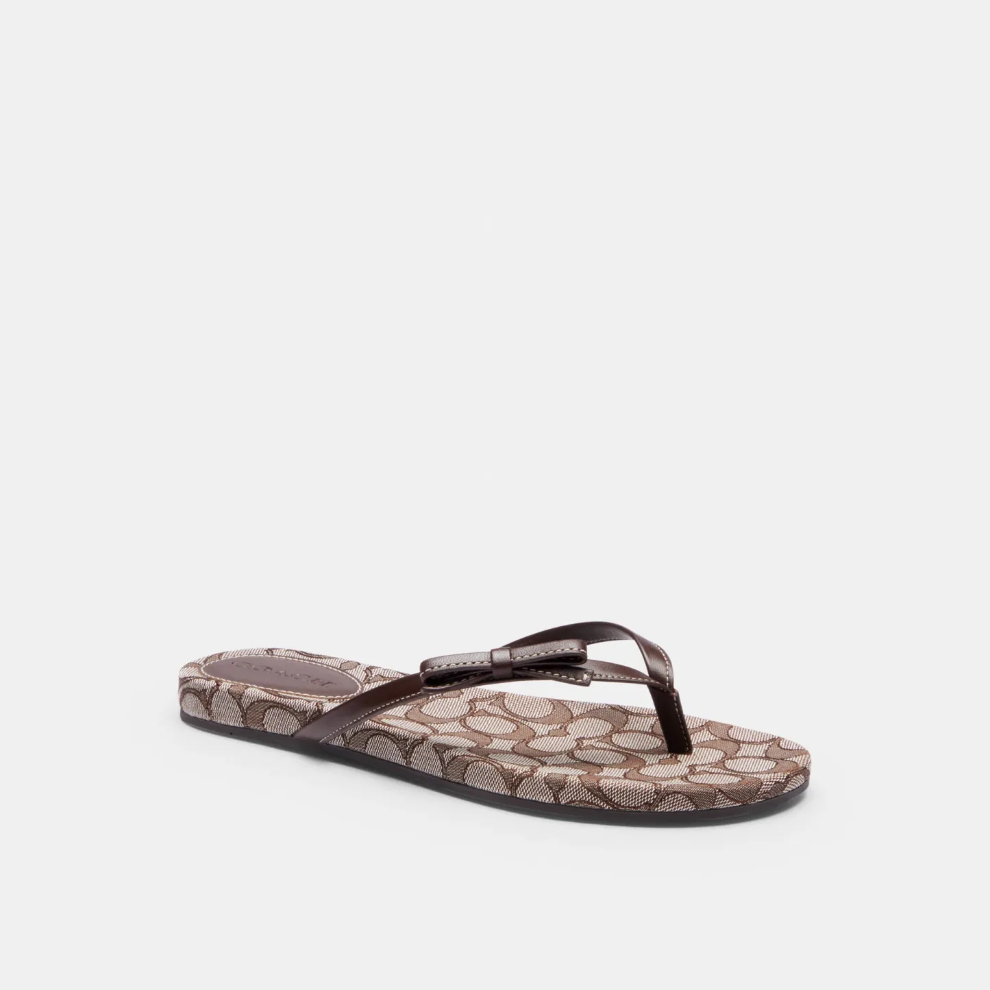 COACH®,Bow Flip Flop In Signature Jacquard,Brown,Front View