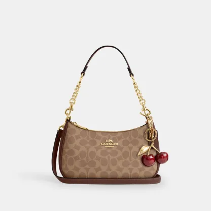 COACH®,Teri Shoulder Bag In Signature Canvas,Shoulder Bag,Logo,Tag Embellishment,Embossed,Metal,Casual,Brown,Angle View