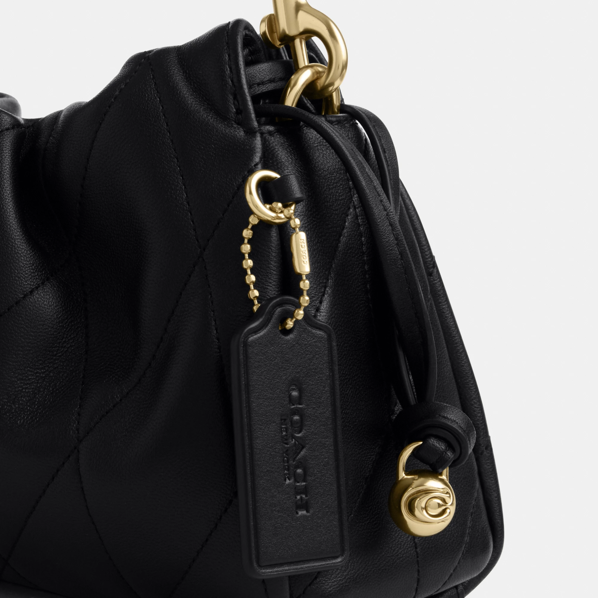 COACH®,Faye Shoulder Bag With Quilting,Shoulder Bag,Ball Embellishment,Logo,Metal,Lined,Adjustable,Gold Metal,Day Party,Black,Closer View